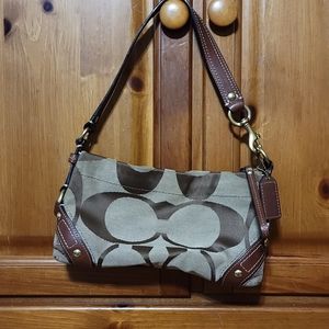 Small Coach purse. Signature C print. Brown & tan